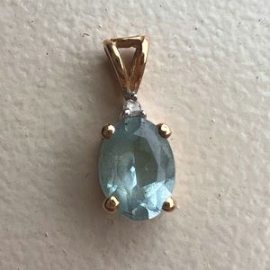 14k gold pendant with aqua blue topaz & Diamond